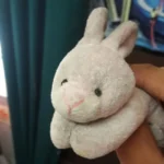 A soft toy bunny used as a customer testimonial avatar