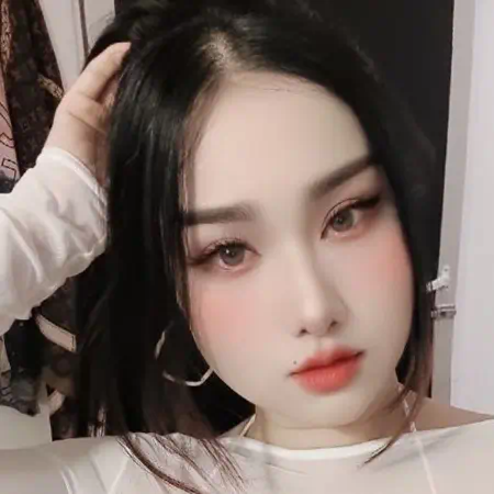 pinkladykl-staff-confident-asian-therapist-black-hair Confident massage therapist at PinkLady KL with sleek black hair, offering relaxing and discreet B2B sessions in Kuala Lumpur.